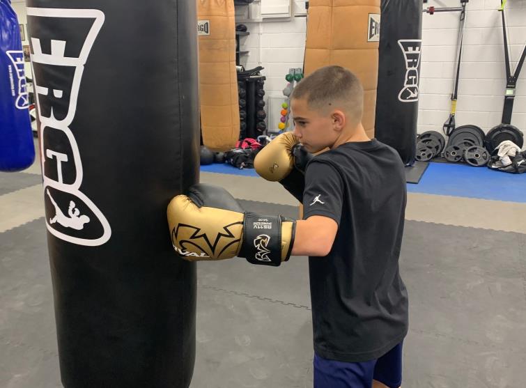 Louie shows his power on the heavy bag